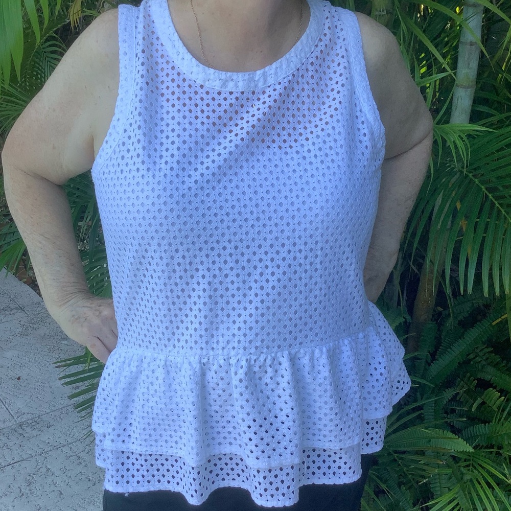 Beautiful chic white top with peplum ruffle detail